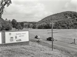 July 1941. "Road on the outskirts of Brattleboro, Vermont." Medium format negative by Jack Delano for the Farm Security Administration. View full size.