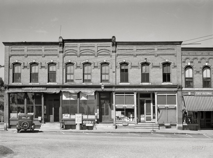 September 1941. "Small-town scenes in Vermont. Storefronts along the main street in South Royalton." Medium format acetate negative by Jack Delano. View full size.
