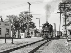 September 1941. "Small town scenes in Vermont. Locomotive passing through Enosburg Falls." Medium format negative by Jack Delano. View full size.