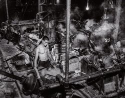 September 1941. "One of the machines that grind wood into pulp at the Mississquoi Corporation paper mill at Sheldon Springs, Vermont." Medium format negative by Jack Delano for the Farm Security Administration. View full size.