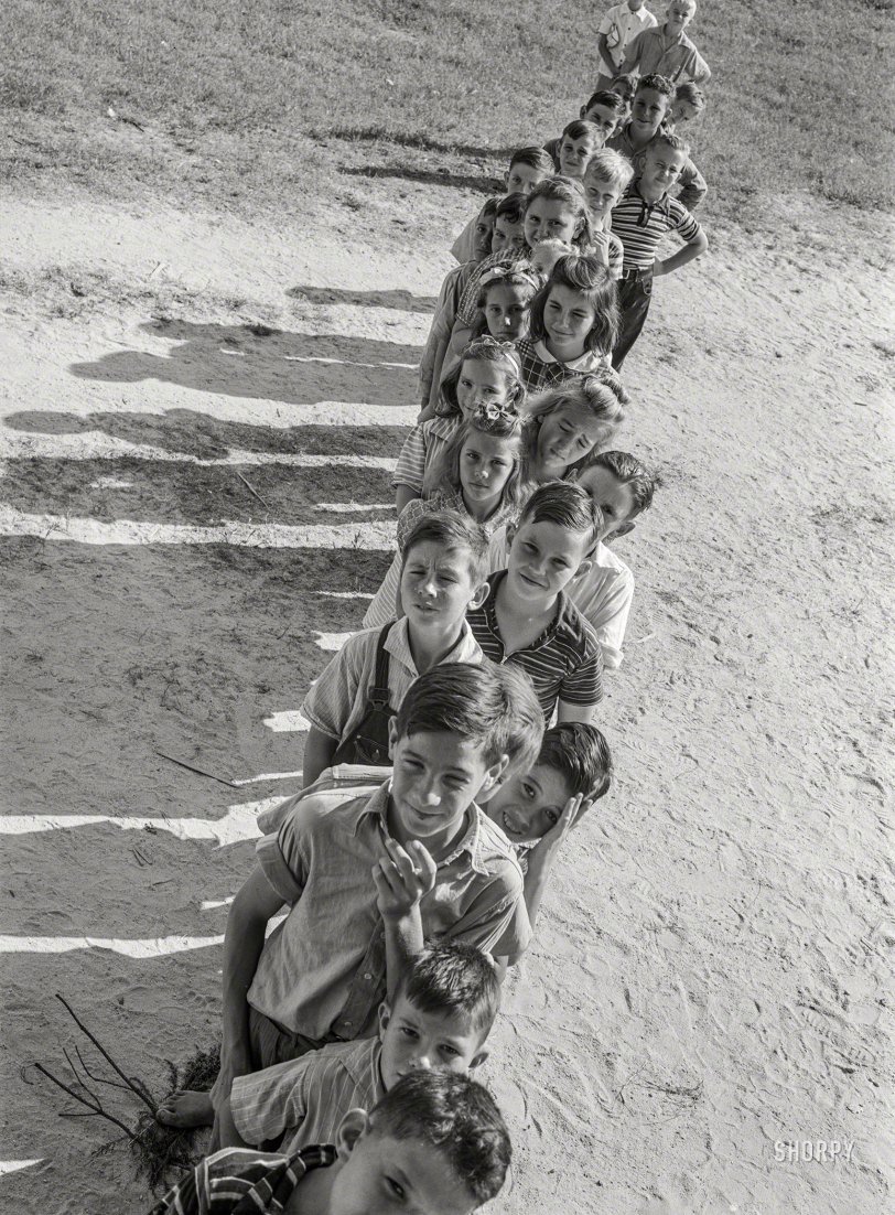 October 1941. "Siloam, Greene County, Georgia. Children at the school." Acetate negative by Jack Delano for the Farm Security Administration. View full size.
