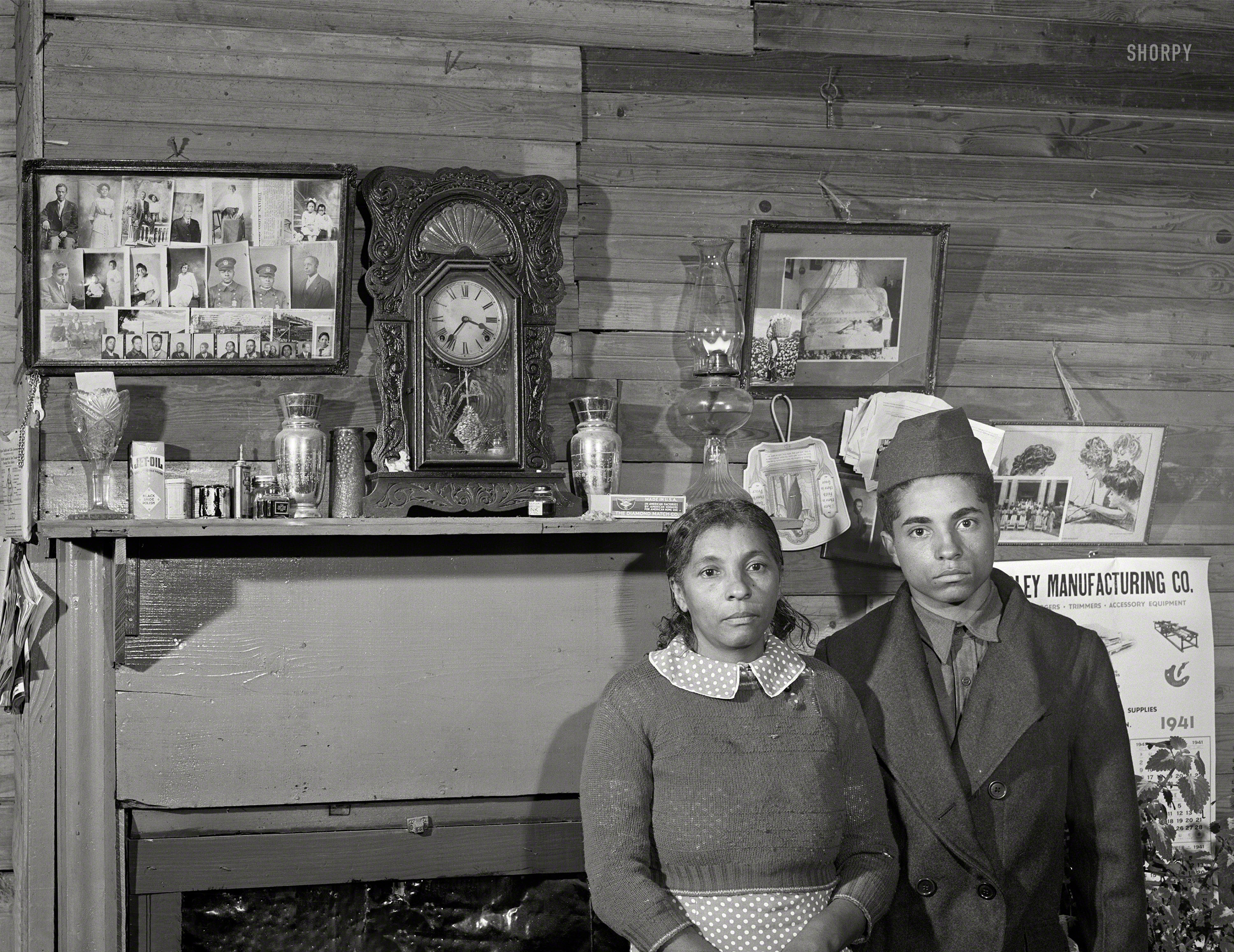 November 1941. "Mrs. Edgar Jones and her son, Farm Security Administration clients near Woodville, Georgia. Her son works at the Civilian Conservation Corps camp." Medium format negative by Jack Delano. View full size.