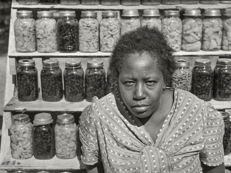October 1941. "Canned goods made by Doc and Julia Miller, FSA client family with 1,000 jars of fruit, vegetables, etc. they have put up for the winter. Near White Plains, Greene County, Georgia." Medium format acetate negative by Jack Delano for the Farm Security Administration. View full size.
