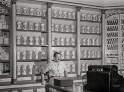 January 1942. "Lares, Puerto Rico. In an apothecary store." Medium format acetate negative by Jack Delano. View full size.