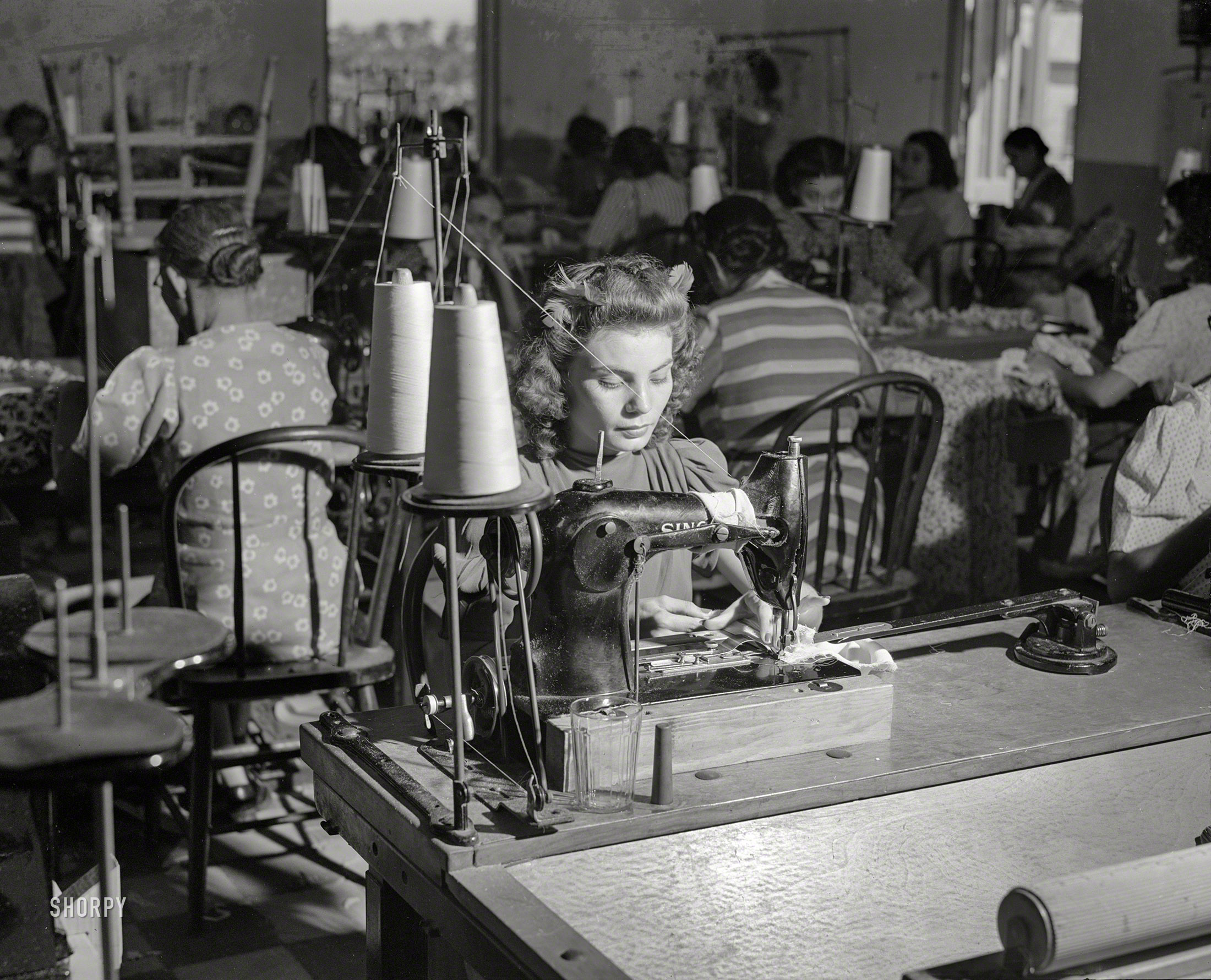 December 1941. "San Juan, Puerto Rico. In a dress factory." Medium format negative by Jack Delano for the Farm Security Administration. View full size.