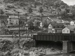 September 1938. "Section of coal mining town near Welch, West Virginia." Possibly the mountain hamlet of Eckman. Medium format negative by Marion Post Wolcott for the Farm Security Administration. View full size.