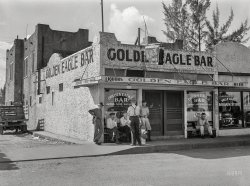 January 1939. "Bar in Belle Glade, Florida, for Negroes." Medium format acetate negative by Marion Post Wolcott for the Farm Security Administration.  View full size.
