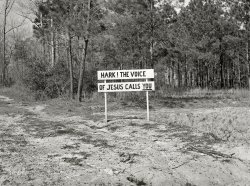 May 1939. "Alabama. The poorer the land, the more frequently one sees religious signs along highways." Photo by Marion Post Wolcott for the Farm Security Administration. View full size.
