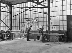 May-June 1939. Atlanta, Georgia. "Woodworking shop at FSA warehouse depot." Acetate negative by Marion Post Wolcott for the Farm Security Administration. View full size.