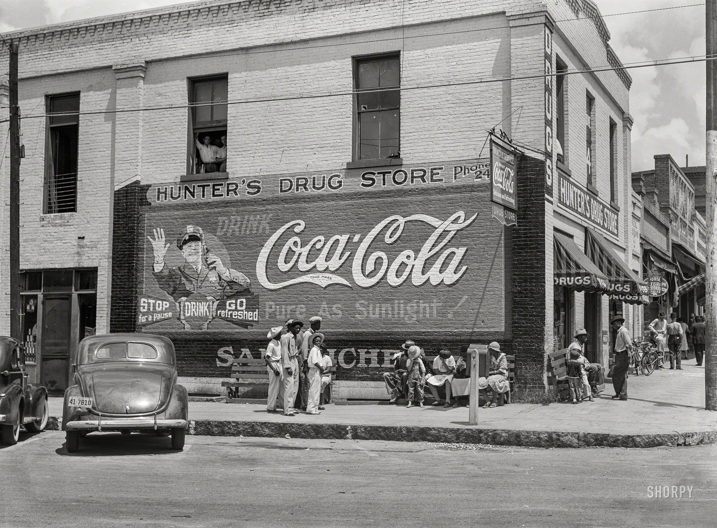 Spring 1939. "General scene, main street. Greensboro, Greene County, Georgia." Medium format negative by Marion Post Wolcott for the Farm Security Administration. View full size.