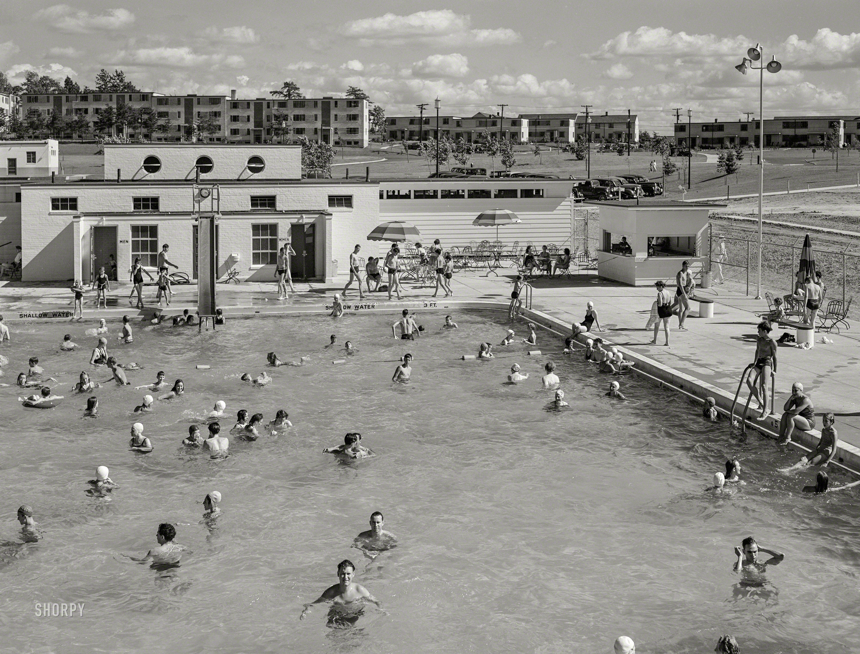 June 1939. "Community swimming pool at Greenbelt, Maryland." Medium format acetate negative by Marion Post Wolcott for the Farm Security Administration. View full size.
