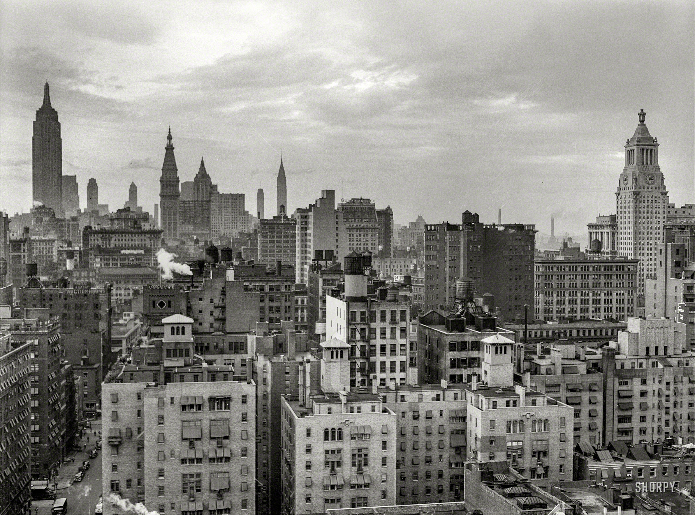 September 1939. "A grey day in New York City, looking northeast from University Place." Medium format acetate negative by Marion Post Wolcott. View full size.