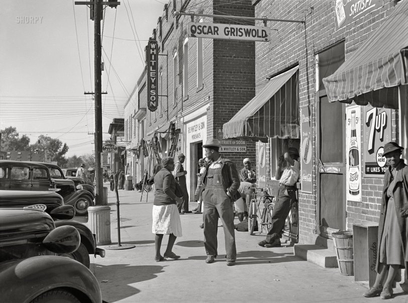 November 1939. "Main street of Wendell, North Carolina. Negroes on way to work in tobacco stem factory." Photo by Marion Post Wolcott, Farm Security Administration. View full size.
