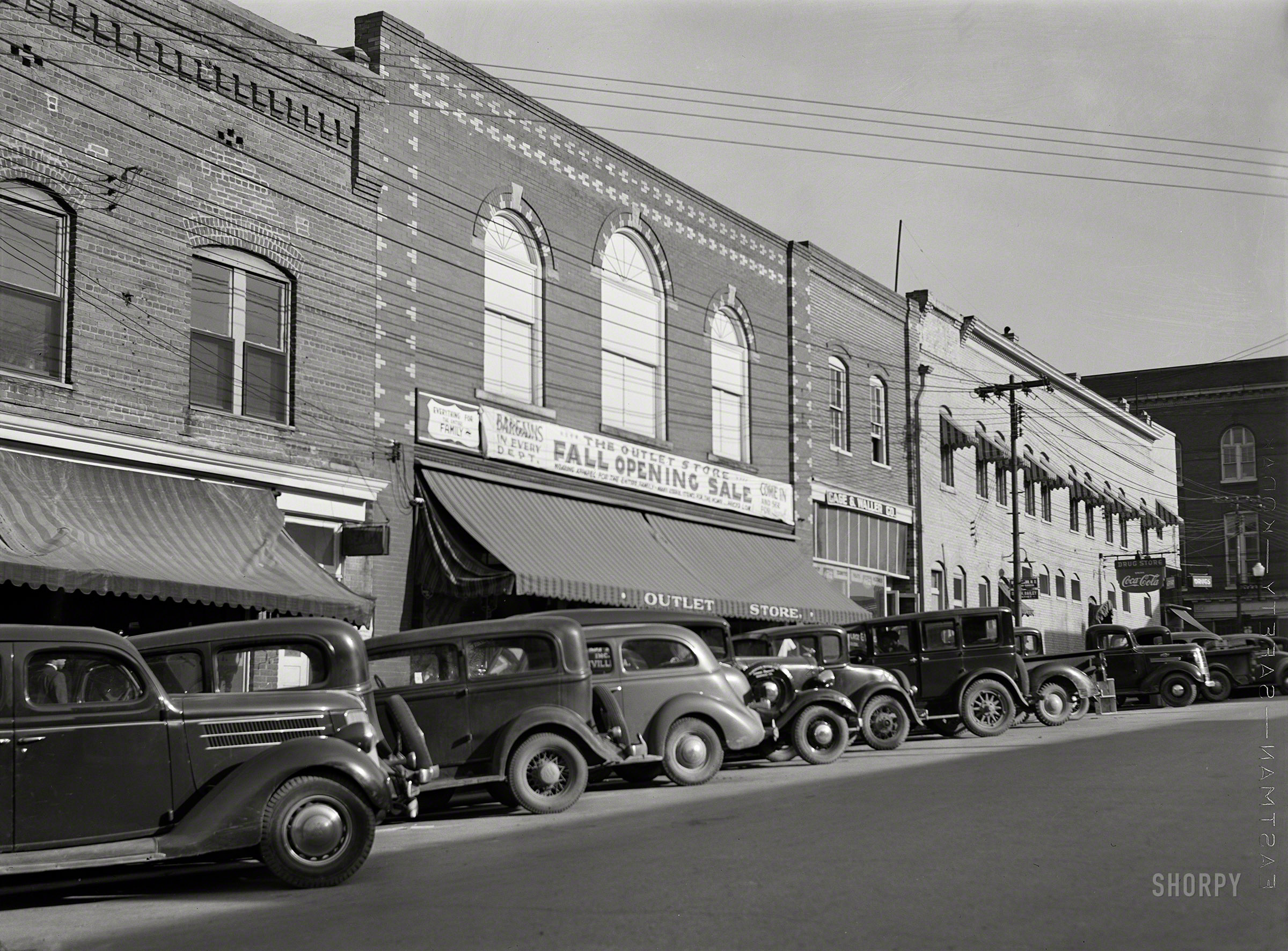 November 1939. "Main street in South Boston, Halifax County, Virginia." Medium format negative by Marion Post Wolcott for the Farm Security Administration. View full size.
