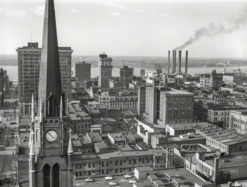 May 1940. "Downtown Louisville, Kentucky; Ohio River in background." Medium format negative by Marion Post Wolcott for the Farm Security Administration. View full size.
