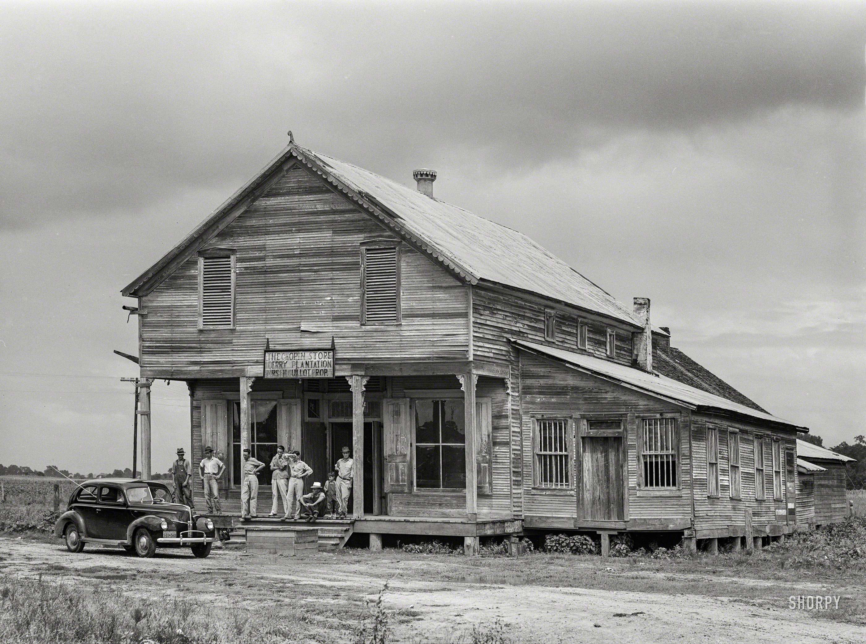 June 1940. "Melrose, Natchitoches Parish, Louisiana. Old cotton plantation store at Derry Plantation." Medium format negative by Marion Post Wolcott. View full size.