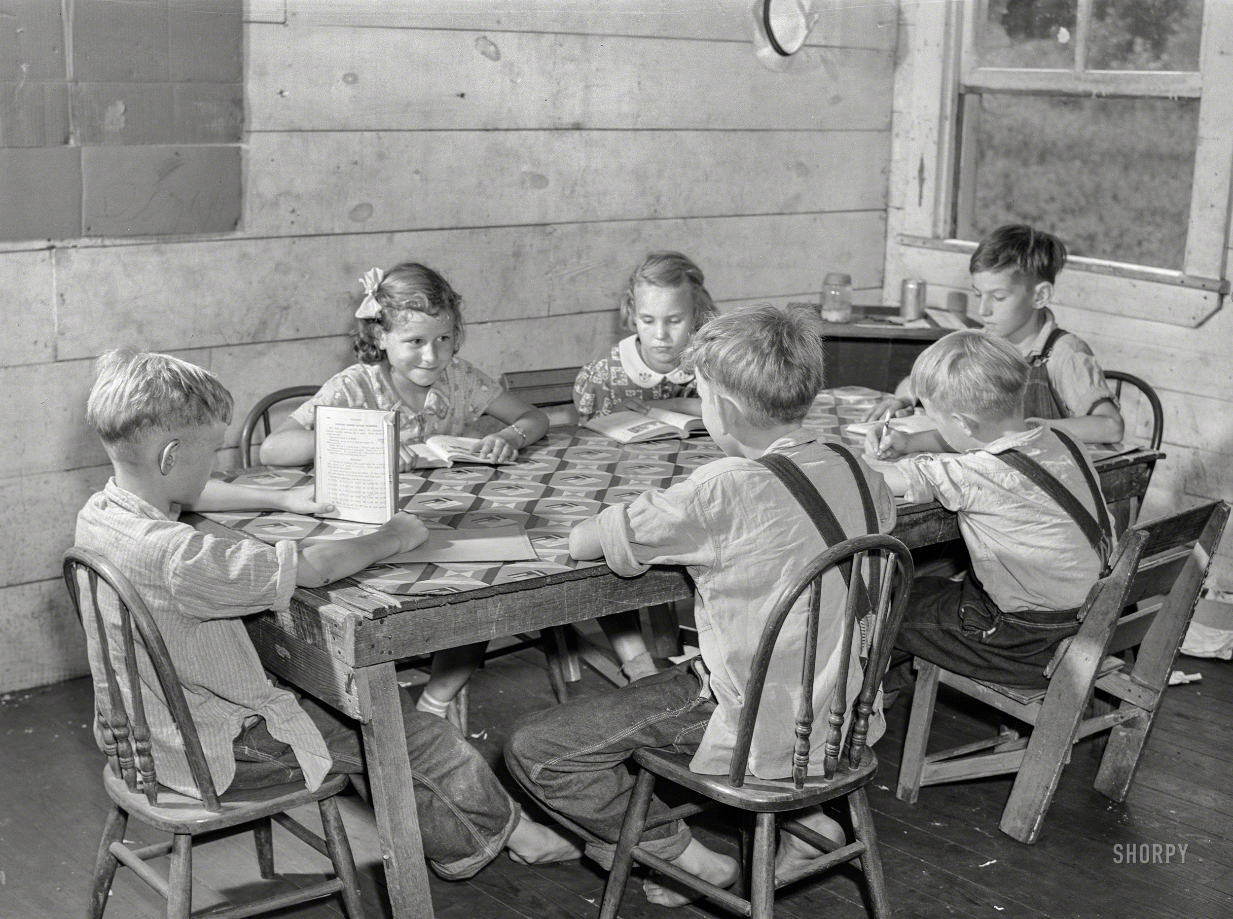 August 1940. "One-room school in Breathitt County, Kentucky." Medium format negative by Marion Post Wolcott for the Farm Security Administration. View full size.