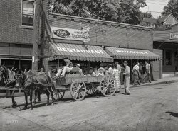 Sept. 1940. "Selling watermelons on Saturdays and court day in Jackson. Breathitt County, Kentucky." Cundiff’s restaurant and package store. Photo: Marion Post Wolcott. View full size.