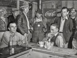 December 1940.  Alexandria, Louisiana. "Construction workers from Camp Livingston eating and hanging around new cafe by entrance of camp." Medium format negative by Marion Post Wolcott for the Farm Security Administration. View full size.