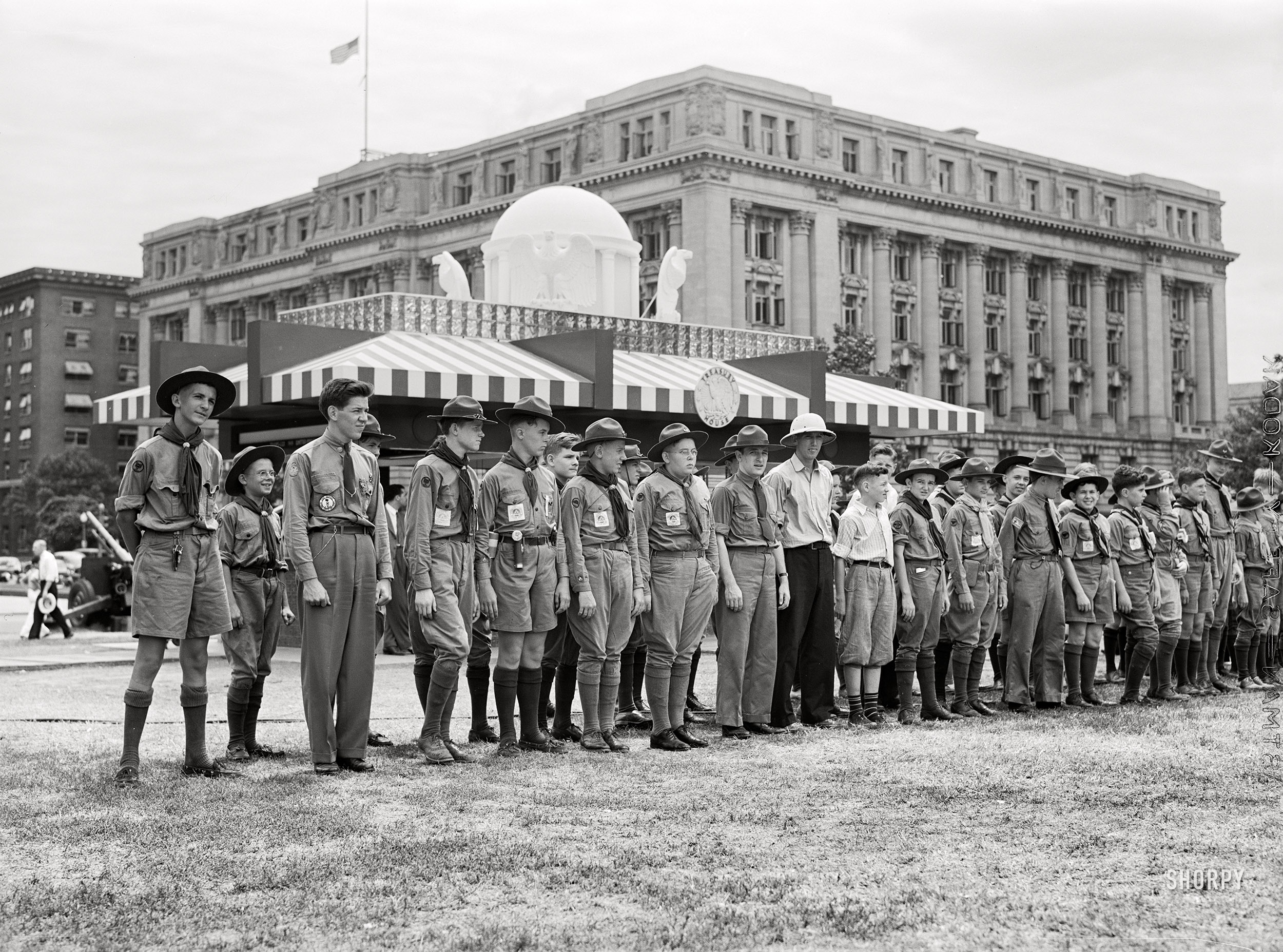 July 1941. "Boy Scouts inspecting and learning about Army equipment in Commerce Square, Washington, D.C." Acetate negative by Marion Post Wolcott. View full size.