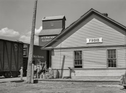 August 1941. "Railroad station in Froid, Montana." Medium format acetate negative by Marion Post Wolcott for the Farm Security Administration. View full size.