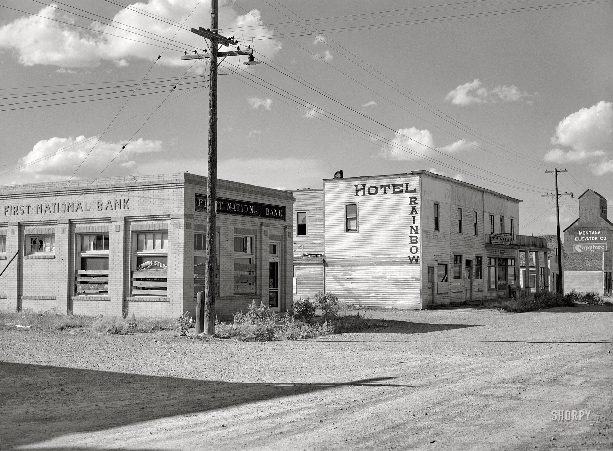 September 1941. "Buildings on main street of ghost town. Judith Basin, Montana." Medium format negative by Marion Post Wolcott for the Farm Security Administration. View full size.