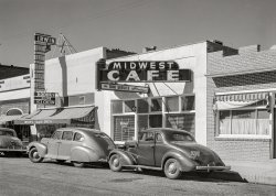 September 1941. "Main street of Craig, Colorado. A new and thriving boom town in the Yampa River Valley." Photo by Marion Post Wolcott for the Farm Security Administration. View full size.
