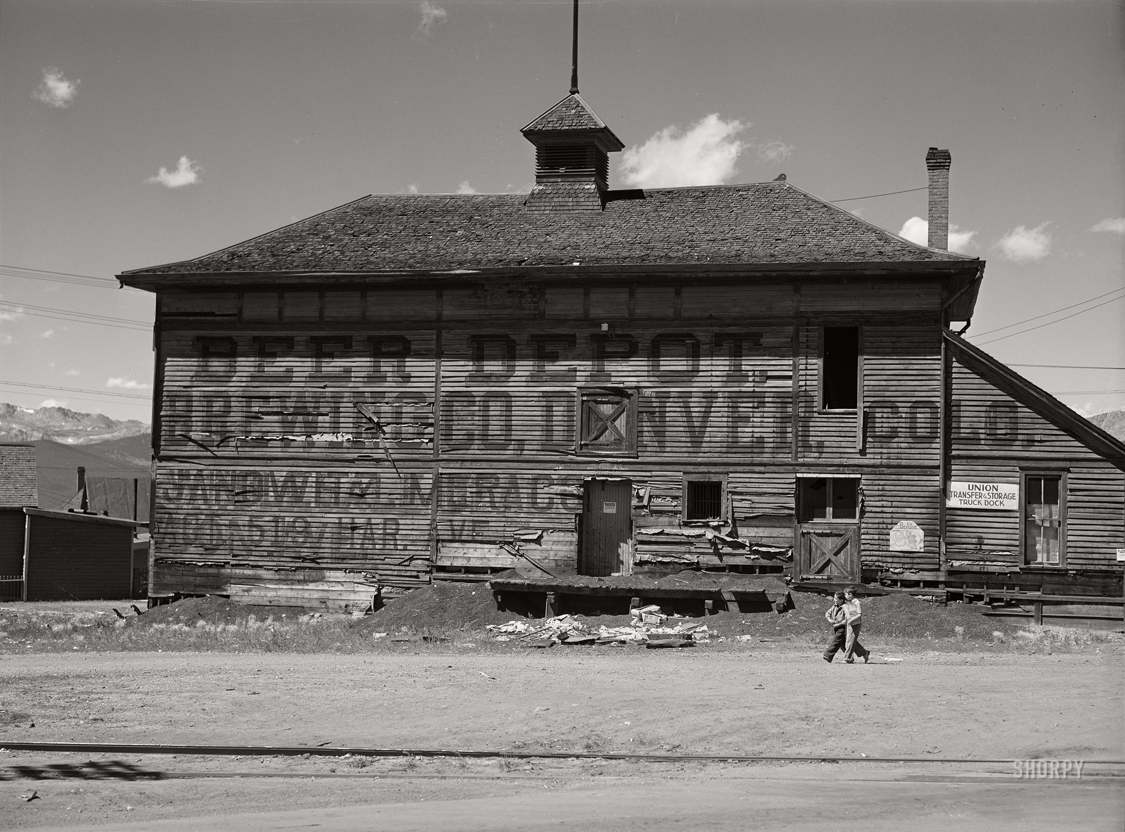 September 1941. "Old beer depot in mining town. Leadville, Colorado." Medium format acetate negative by Marion Post Wolcott for the Farm Security Administration. View full size.