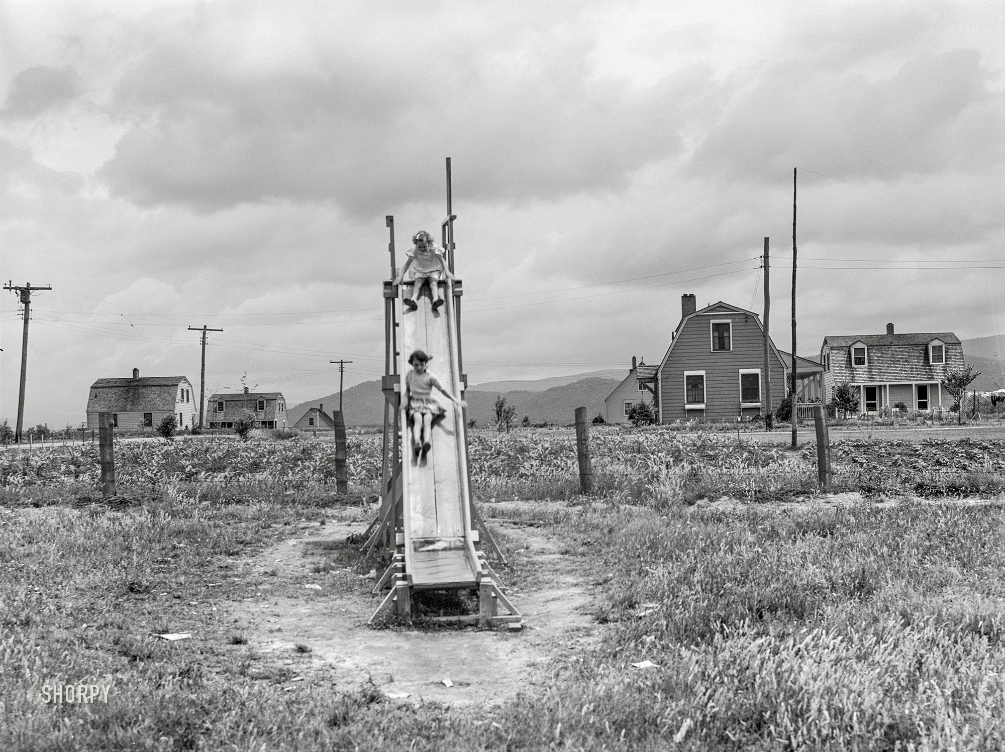 June 1939. "Tygart Valley Homesteads, near Elkins, West Virginia. Children of homesteaders at play. A subsistence homestead project of the U.S. Resettlement Administration." Medium format acetate negative by John Vachon. View full size.
