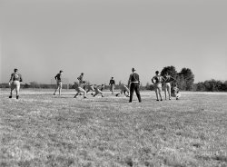 October 1939. "Six-man football played in high school at Greenhills, Ohio." Medium format acetate negative by John Vachon for the Farm Security Administration. View full size.