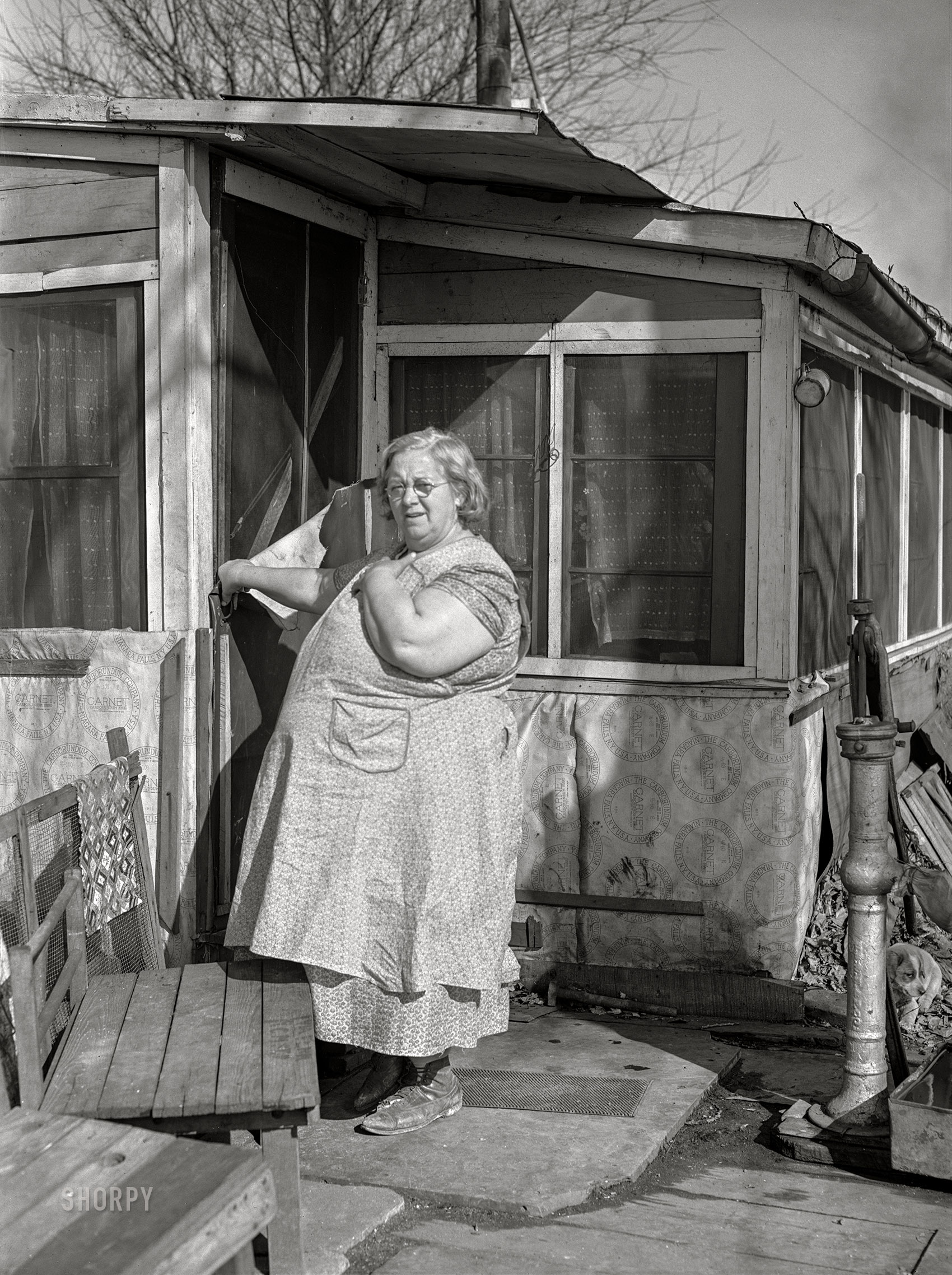 April 1940. "Resident of riverfront shacktown. Dubuque, Iowa." Medium format acetate negative by John Vachon for the Farm Security Administration. View full size.