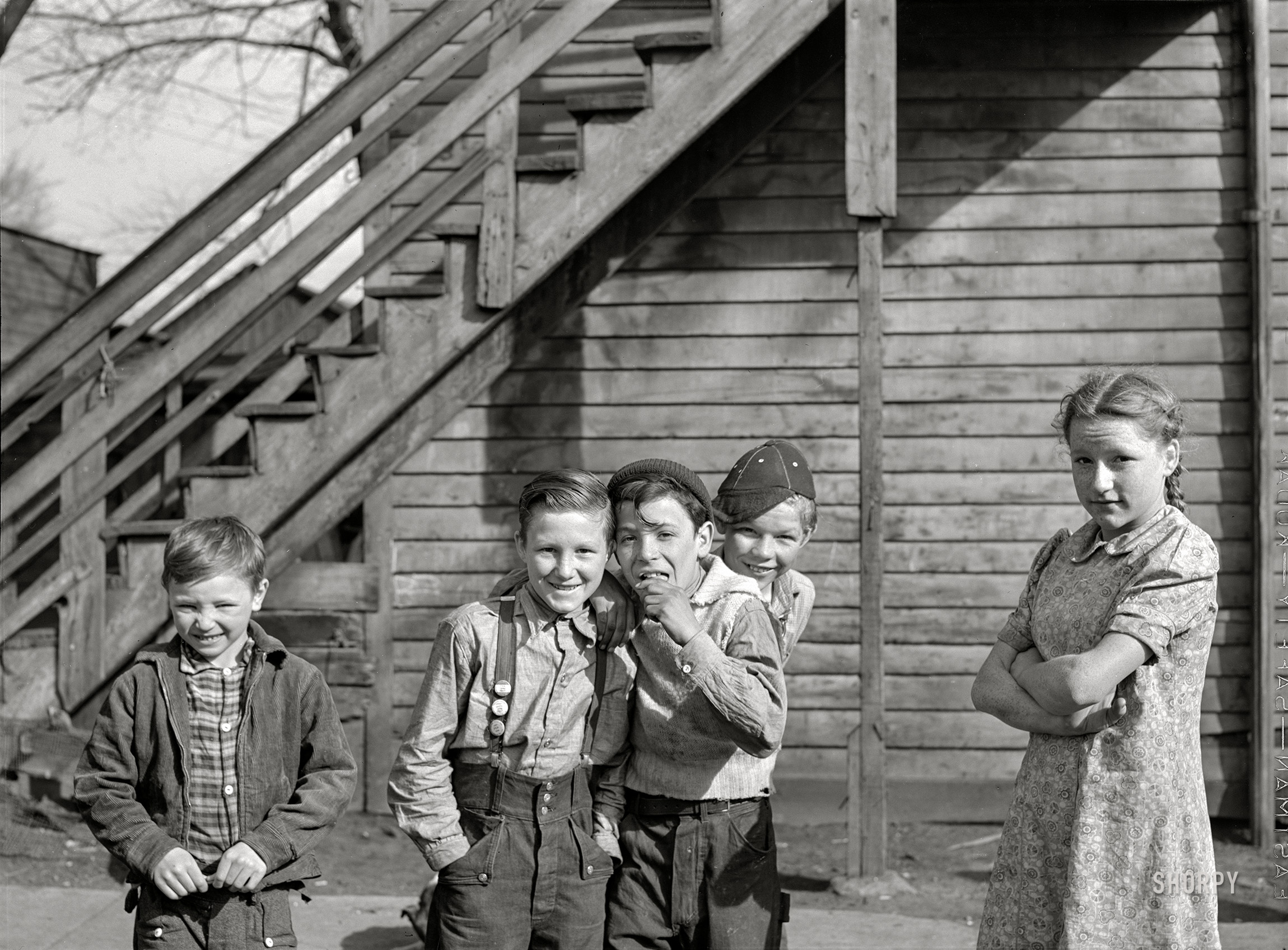 April 1940. "Children. Dubuque, Iowa" is all it says here. Medium format acetate negative by John Vachon for the Resettlement Administration. View full size.