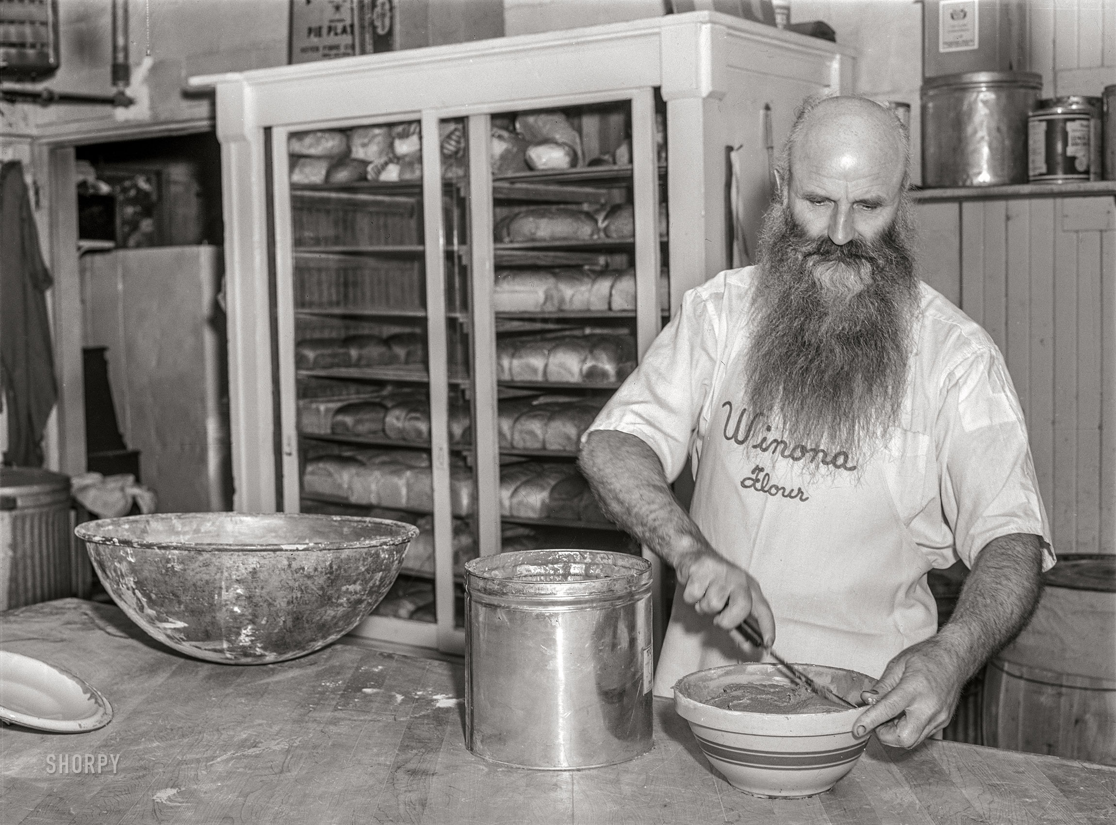 July 1940. Benton Harbor, Michigan. "Baker at the House of David religious community." Acetate negative by John Vachon for the Farm Security Administration. View full size.