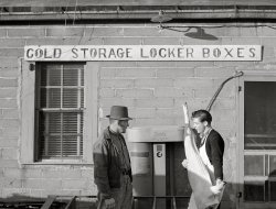 October 1940. "Cooperative cold storage lockers in Casselton, North Dakota, where farmers bring their own butchered pigs. Next year butchering will be done here. This co-op received a $4,500 loan from the Farm Security Administration." Photo by John Vachon. View full size.