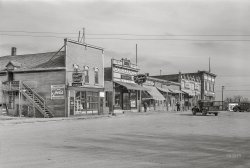 October 1937. "Main street in Michigan, North Dakota." Medium format acetate negative by Russell Lee for the Farm Security Administration. View full size.