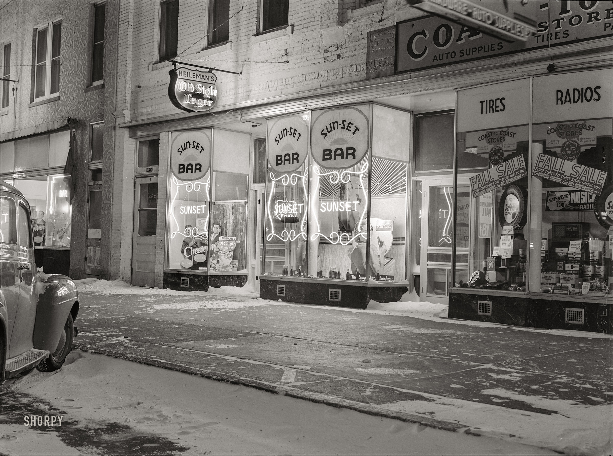 November 1940. "Pierre, South Dakota, on a cold night." Medium format acetate negative by John Vachon for the Farm Security Administration. View full size.
&nbsp; &nbsp; &nbsp; &nbsp; About these images: The exposures by John Vachon, Marion Post Wolcott and other FSA photographers that we've been posting over the past few months may be around 80 years old, but have only recently been scanned in high resolution and made available for download by the Library of Congress. So in that sense they're "new" -- the photo above, for example, is from a batch of around 300 negatives scanned in October 2019 and published to the LOC website on December 12. These high-quality scans are gradually replacing the low-resolution images that have populated the LOC's online archive since 2011.
