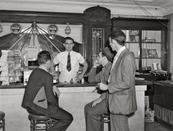 November 1940. "Boys in soft drink parlor. Central City, Kentucky." Medium format acetate negative by John Vachon for the Farm Security Administration. View full size.