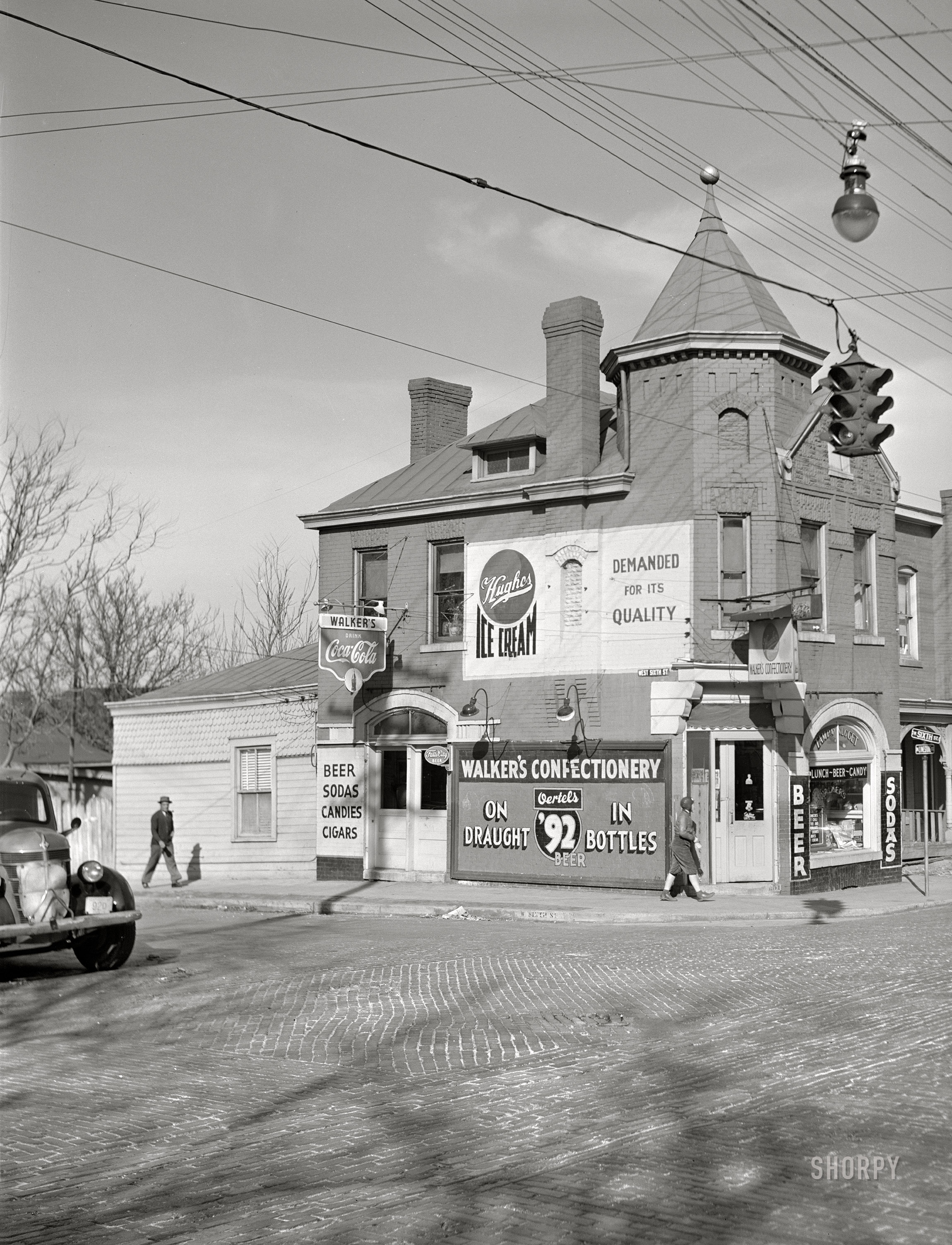November 1940. "Corner store in Lexington, Kentucky." Medium format acetate negative by John Vachon for the Farm Security Administration. View full size.