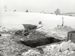 January 1941. "Newly-dug grave. Rochester, Pennsylvania." Medium format negative by John Vachon for the Farm Security Administration. View full size.