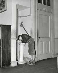 March 1941. Norfolk, Virginia. "A miscellany of pictures in overcrowded Navy towns. Corridor in public school." Medium format acetate negative by John Vachon. View full size.