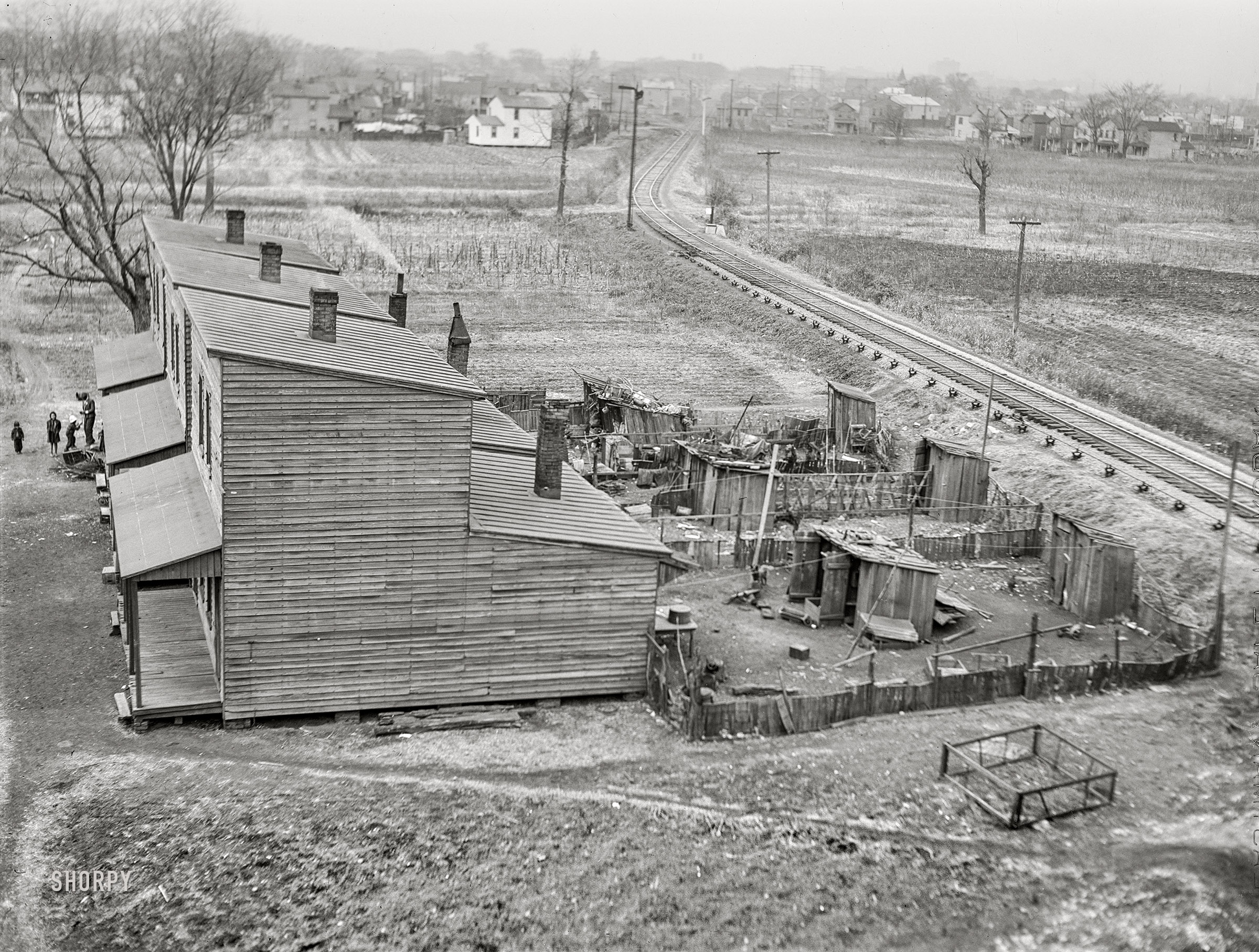 March 1941. "Overcrowded Navy towns -- housing in Norfolk, Virginia." Medium format acetate negative by John Vachon for the Farm Security Administration. View full size.