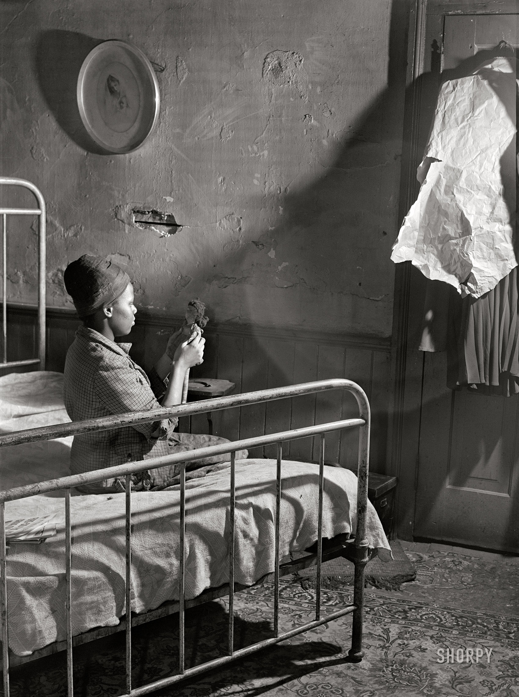 March 1941. "Bedroom. House in Negro slum district. Norfolk, Virginia." Medium format acetate negative by John Vachon for the Farm Security Administration. View full size.