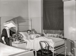 March 1941. "Charity ward, Saint Vincent's Hospital, Norfolk, Virginia." Medium format acetate negative by John Vachon for the Farm Security Administration. View full size.
