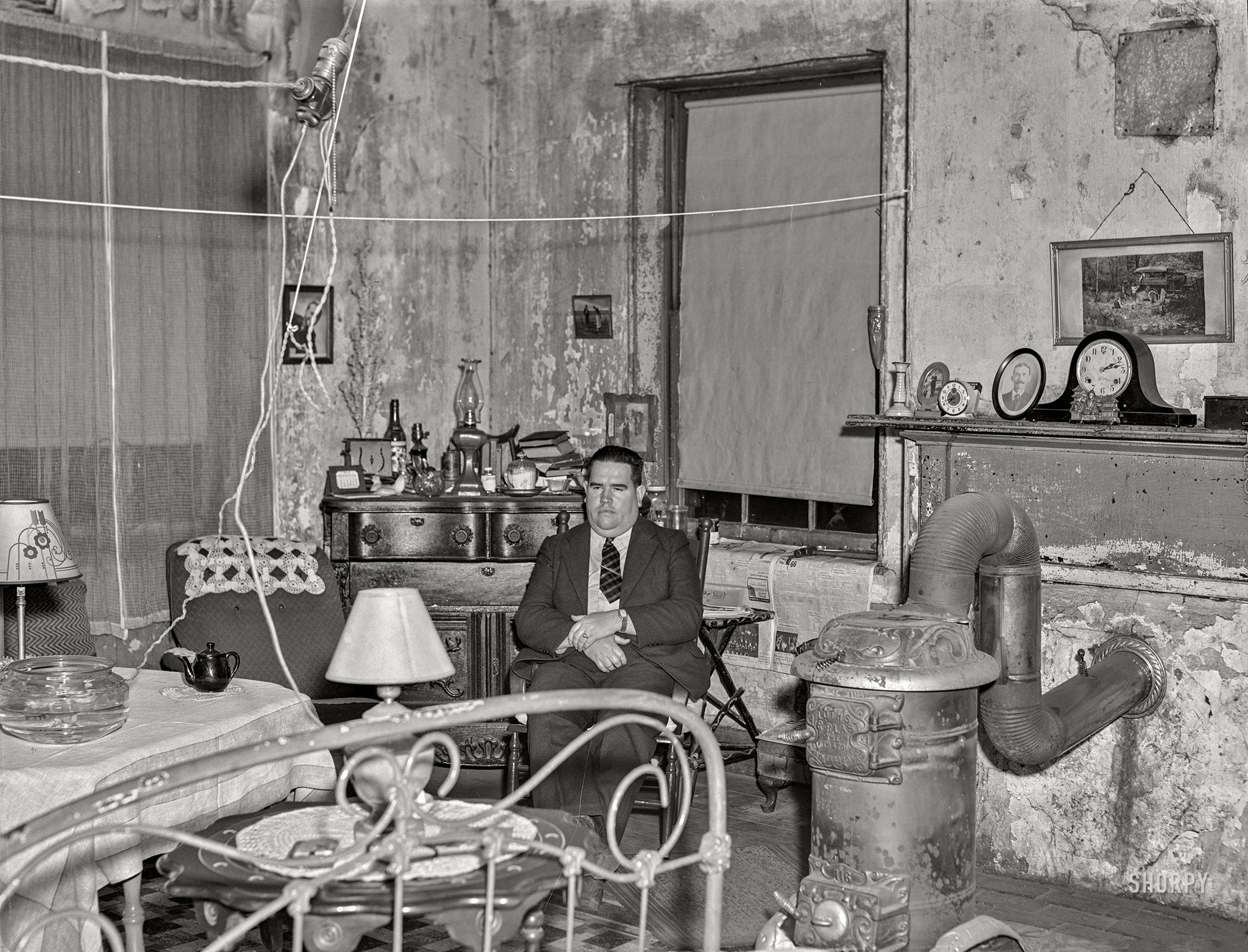 March 1941. "Mission pianist in his room at the Helping Hand Mission. Portsmouth, Virginia." Acetate negative by John Vachon for the Farm Security Administration. View full size.