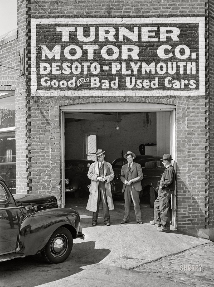 March 1941. "Bedford, Virginia." Would you buy a used DeSoto from these men? Medium format acetate negative by John Vachon for the Farm Security Administration. View full size.
