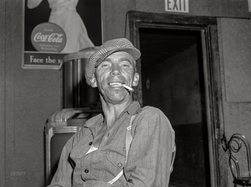 August 1941. "Farm worker in beer parlor on a Sunday afternoon. Bruce Crossing, Michigan." Acetate negative by John Vachon for the Farm Security Administration. View full size.
