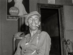 August 1941. "Farm worker in beer parlor on a Sunday afternoon. Bruce Crossing, Michigan." Acetate negative by John Vachon for the Farm Security Administration. View full size.