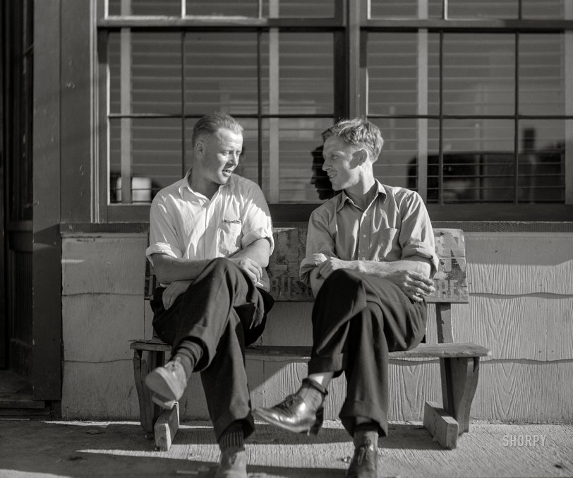 August 1941. "Sunday afternoon. Farm boys in front of beer parlor in the Finnish community of Bruce Crossing, Michigan." Medium format acetate negative by John Vachon. View full size.