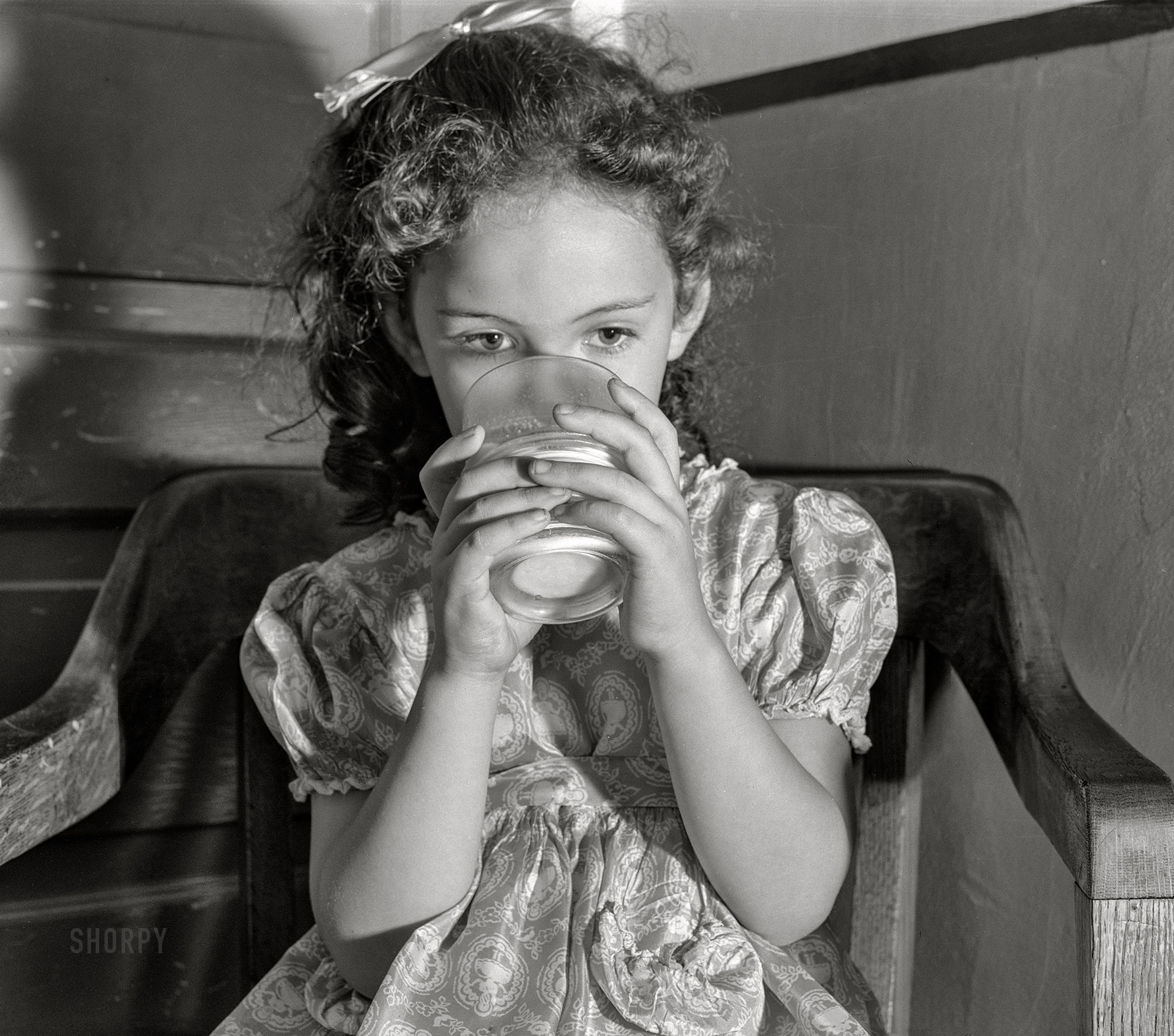 August 1941. "Child drinking milk. Duluth, Minnesota." Medium format acetate negative by John Vachon for the Farm Security Administration. View full size.