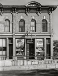 August 1941. "Drug store. Carpentersville, Illinois." Medium format acetate negative by John Vachon for the Farm Security Administration. View full size.
Still looking good at 143
(The Gallery, John Vachon, Small Towns, Stores & Markets)